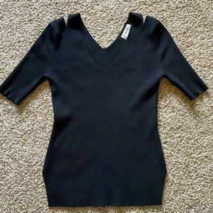 Woman’s cold shoulder knit top,like new , wore only once .